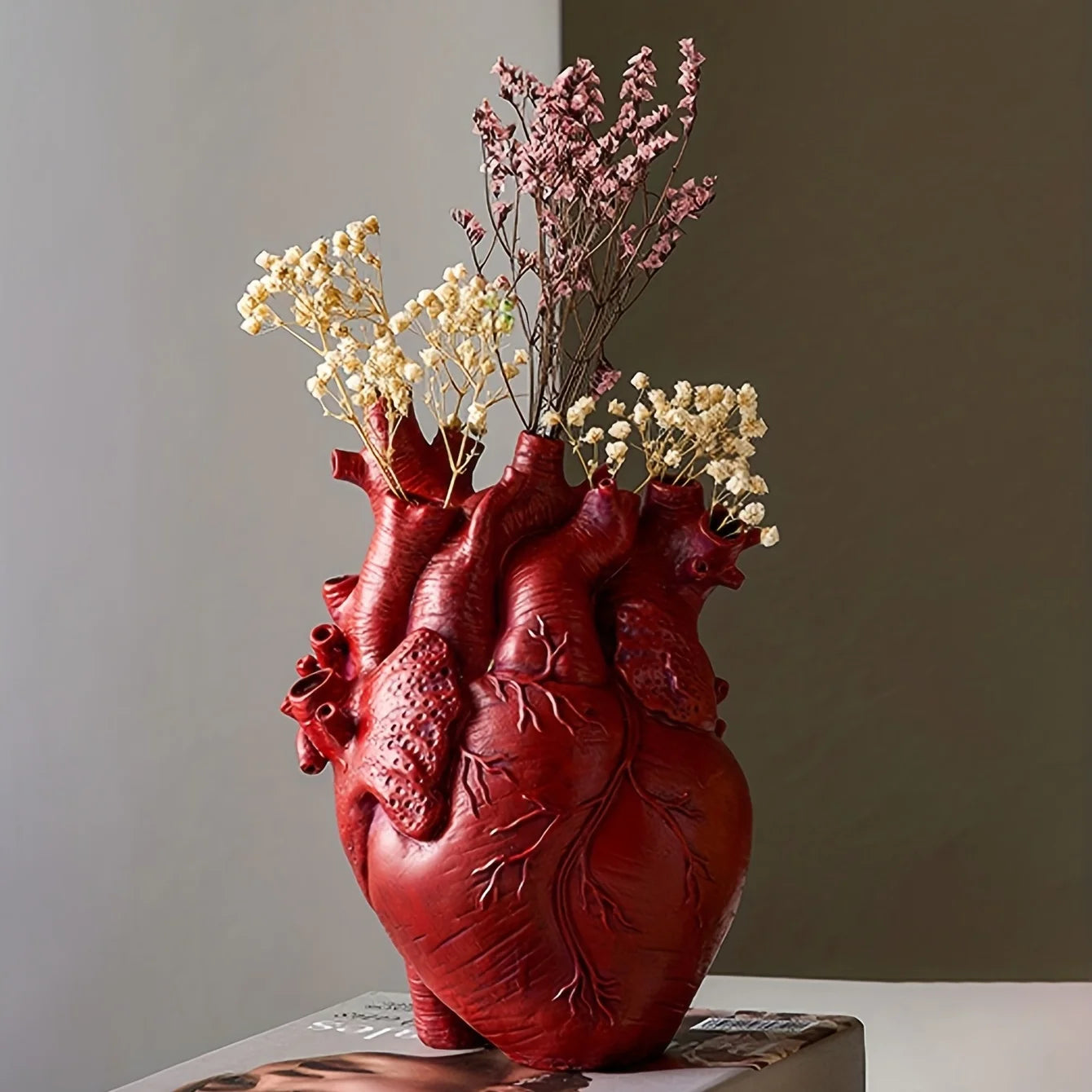 This striking Anatomical Heart Resin Vase is a must-have for anyone looking to add a touch of glam to their tabletop decor. Double Cart provides Best products for your home in Denver, CO.