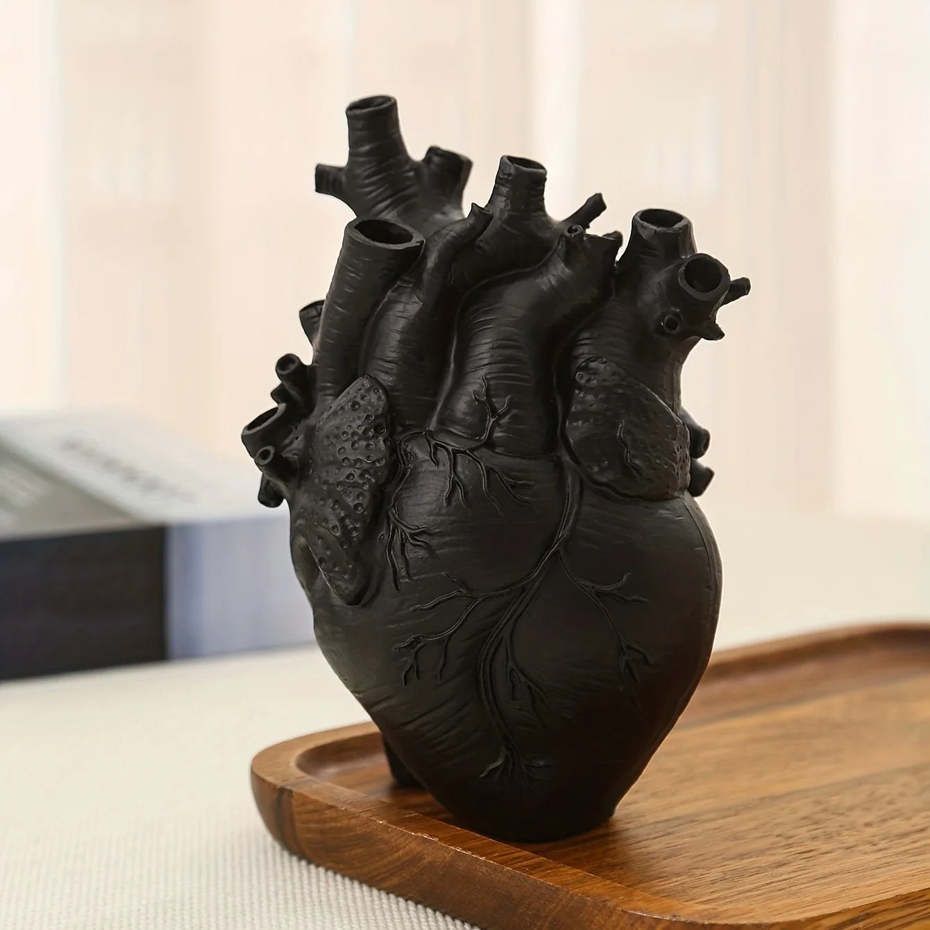 This striking Anatomical Heart Resin Vase is a must-have for anyone looking to add a touch of glam to their tabletop decor. Double Cart provides Best products for your home in Nashville, TN.