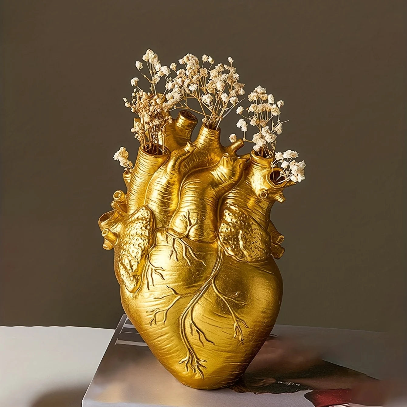 This striking Anatomical Heart Resin Vase is a must-have for anyone looking to add a touch of glam to their tabletop decor. Double Cart provides Best products for your home in Raleigh, NC.
