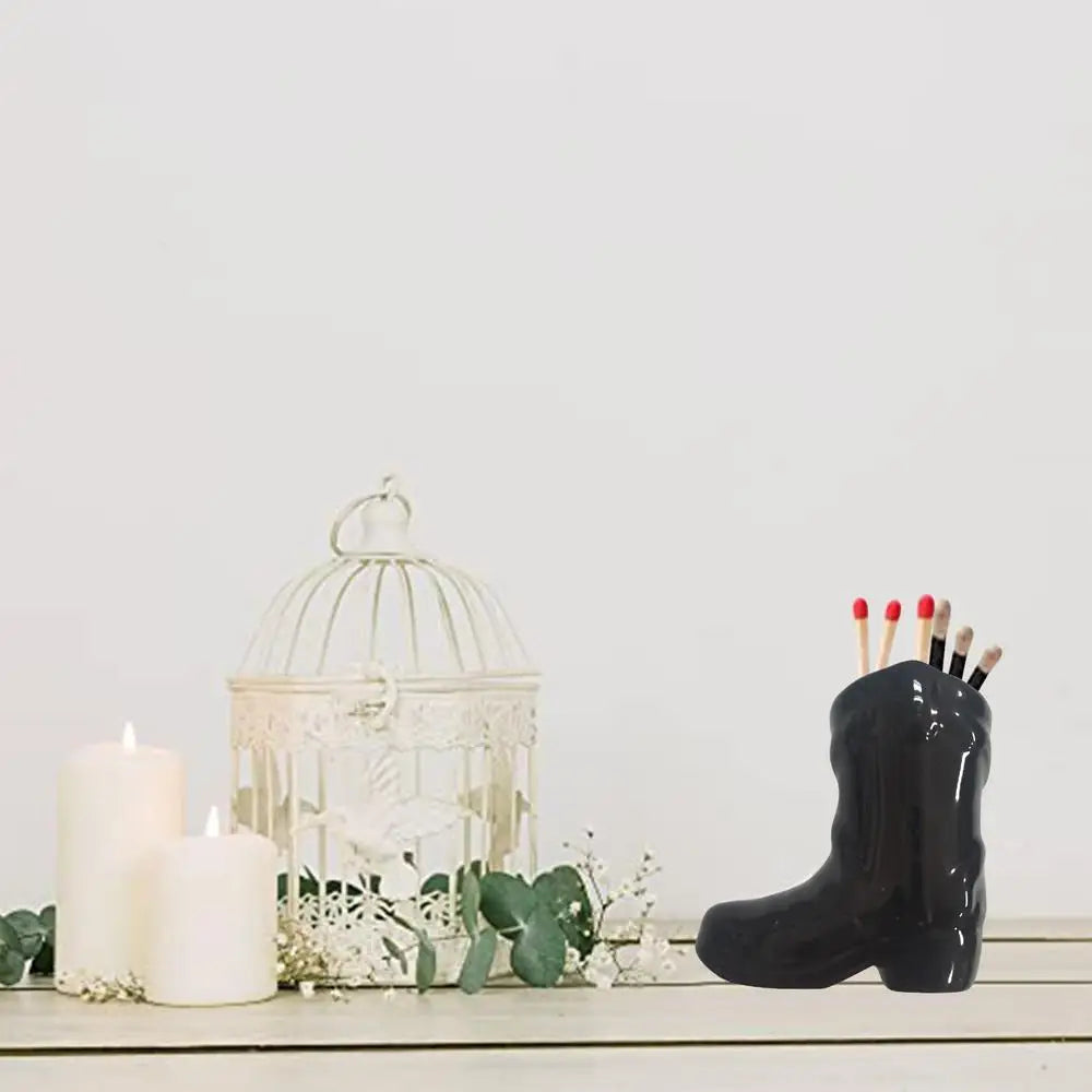 Introducing the Cowboy Boot Ceramic Match Holder with Igniter - a delightful addition to your home decor for fireplace and kitchen. Double Cart provides Best products for your home in Minneapolis, MN.