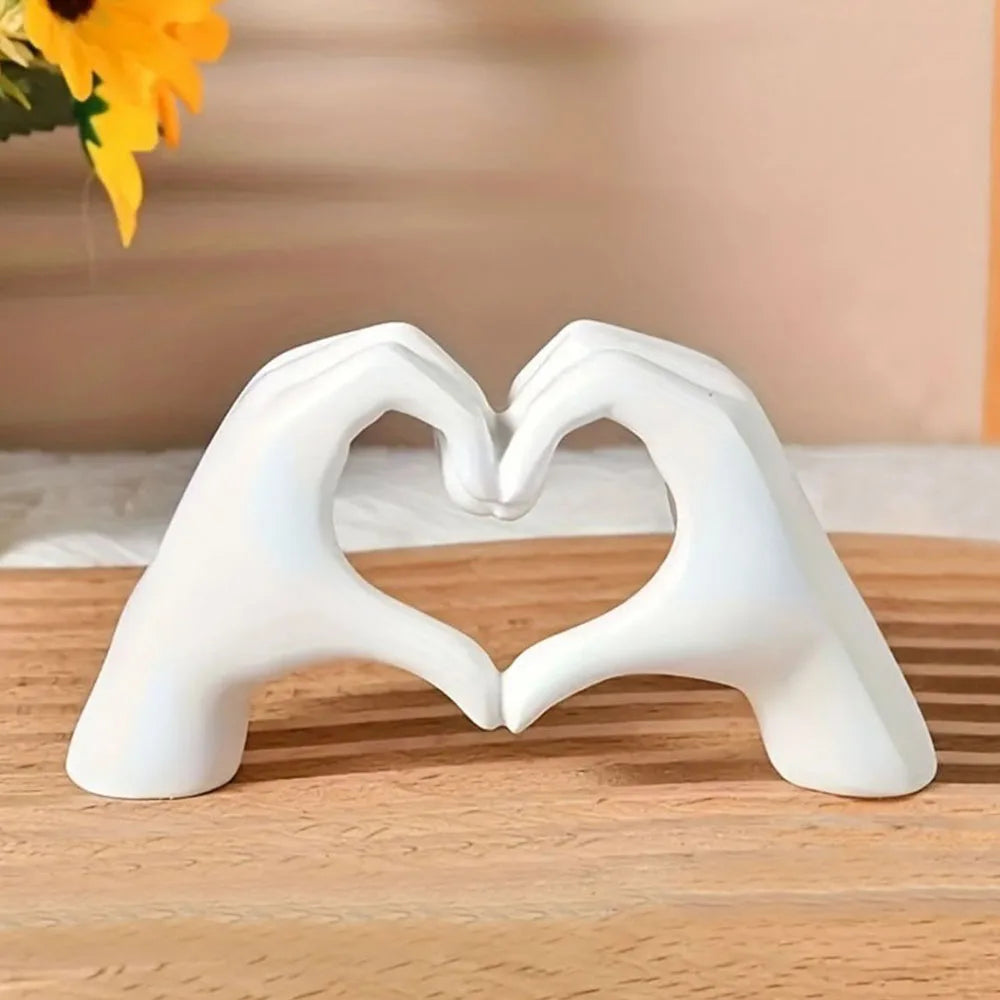 Introducing the stunning Love Gesture Statue Sculpture, a perfect piece for decorating your home desk or bookshelf. Double Cart provides Best products for your home in Charlotte, NC.
