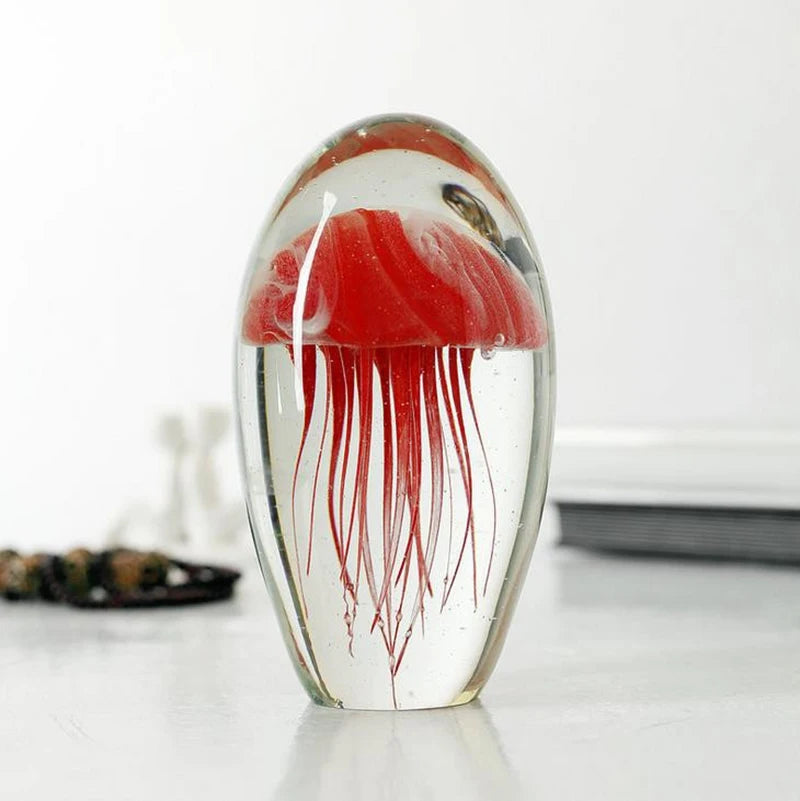 Add a touch of whimsy and elegance to your living space with this stunning Handmade Glass Jellyfish Figurine. Double Cart provides Best products for your home in Tampa, FL.