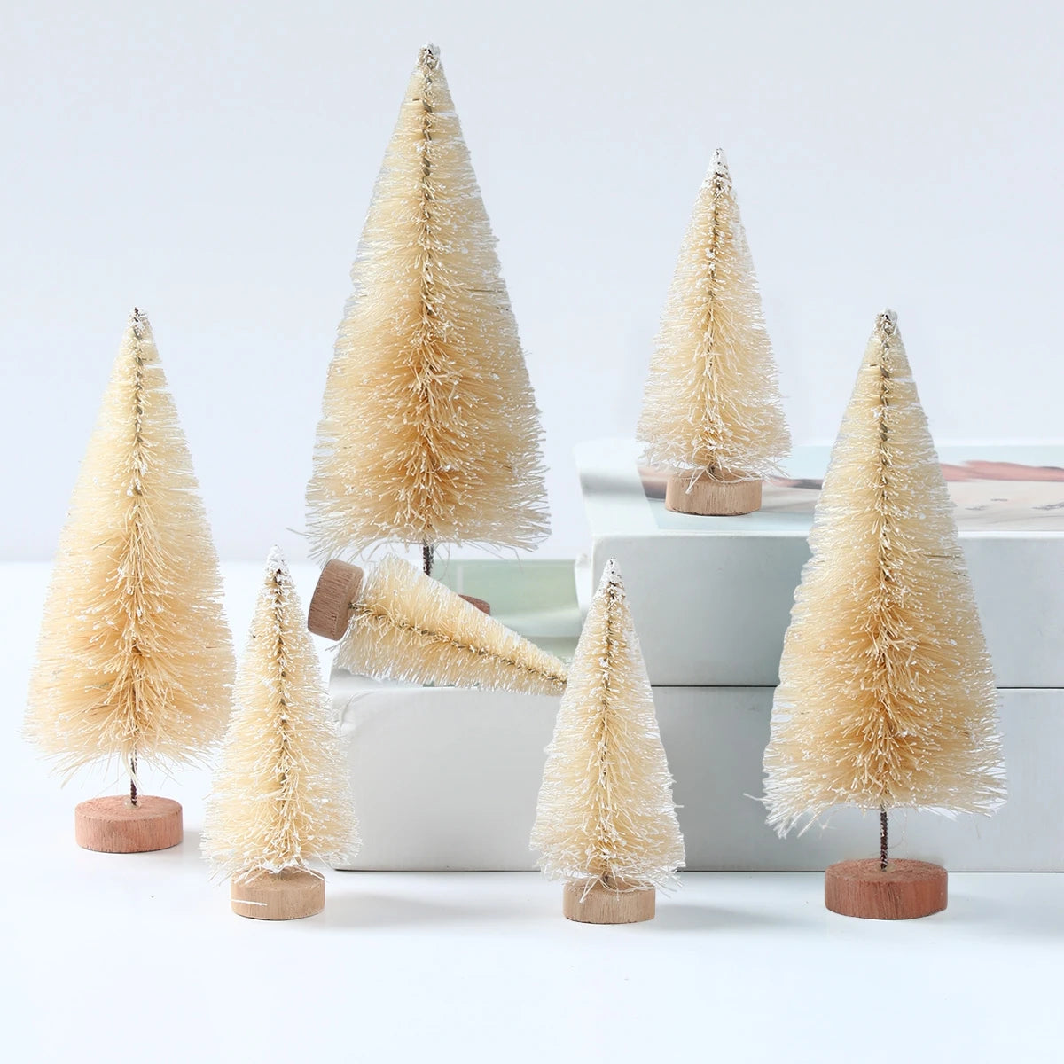 Introducing the charming Mini Wooden Christmas Tree Tabletop Ornament Decor! Handcrafted with care using small sisal pine, this adorable piece adds a touch of festive cheer to any space. Double Cart provides Best products for your home in Las Vegas, NV.