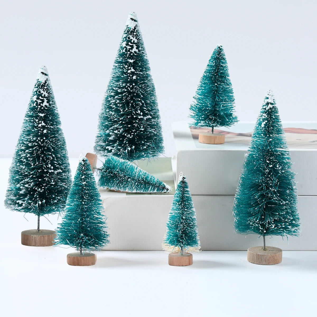 Introducing the charming Mini Wooden Christmas Tree Tabletop Ornament Decor! Handcrafted with care using small sisal pine, this adorable piece adds a touch of festive cheer to any space. Double Cart provides Best products for your home in Raleigh, NC.