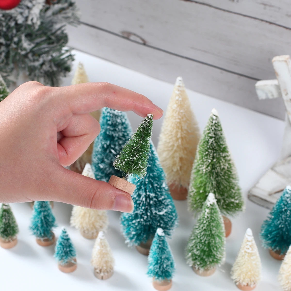 Introducing the charming Mini Wooden Christmas Tree Tabletop Ornament Decor! Handcrafted with care using small sisal pine, this adorable piece adds a touch of festive cheer to any space. Double Cart provides Best products for your home in San Diego, CA.