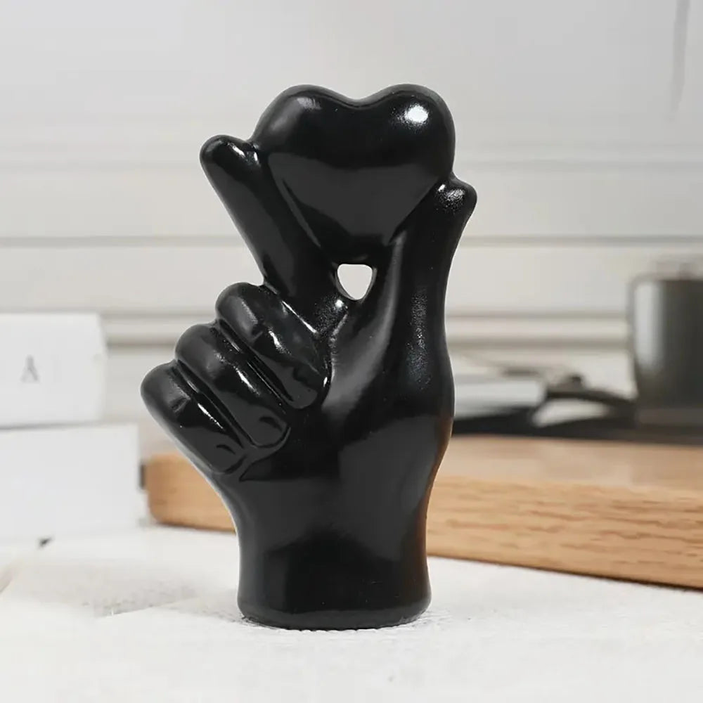 This stunning Heart Gesture Sculpture is a charming addition to any desktop or shelf. Double Cart provides Best products for your home in Chicago, IL.