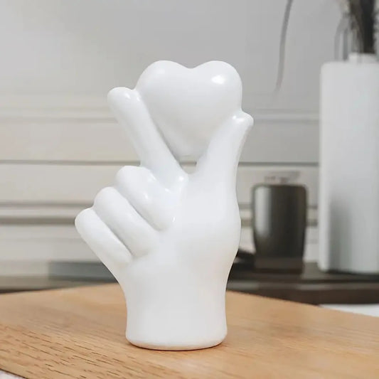 This stunning Heart Gesture Sculpture is a charming addition to any desktop or shelf. Double Cart provides Best products for your home in Denver, CO.