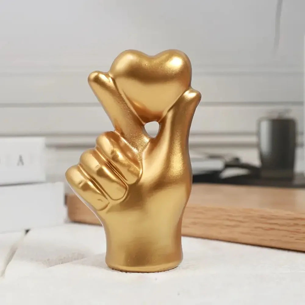 This stunning Heart Gesture Sculpture is a charming addition to any desktop or shelf. Double Cart provides Best products for your home in Houston, TX.